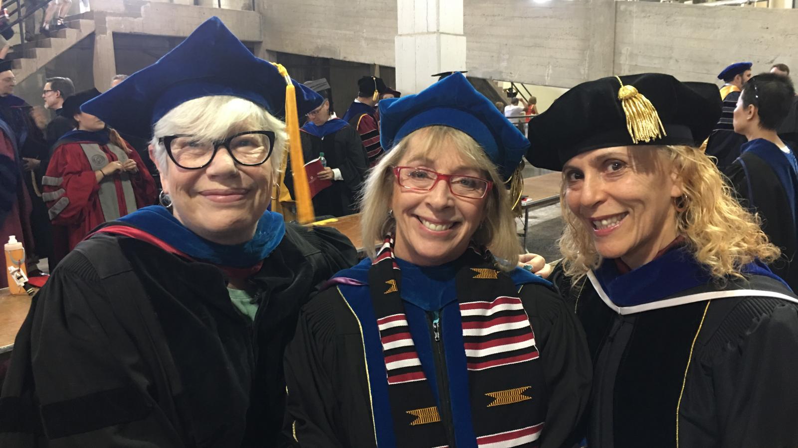 Dr.'s Smith-Shank, Ballengee Morris, and Goldberg-Miller (left to right) prepare to hood soon to be PhD alumni