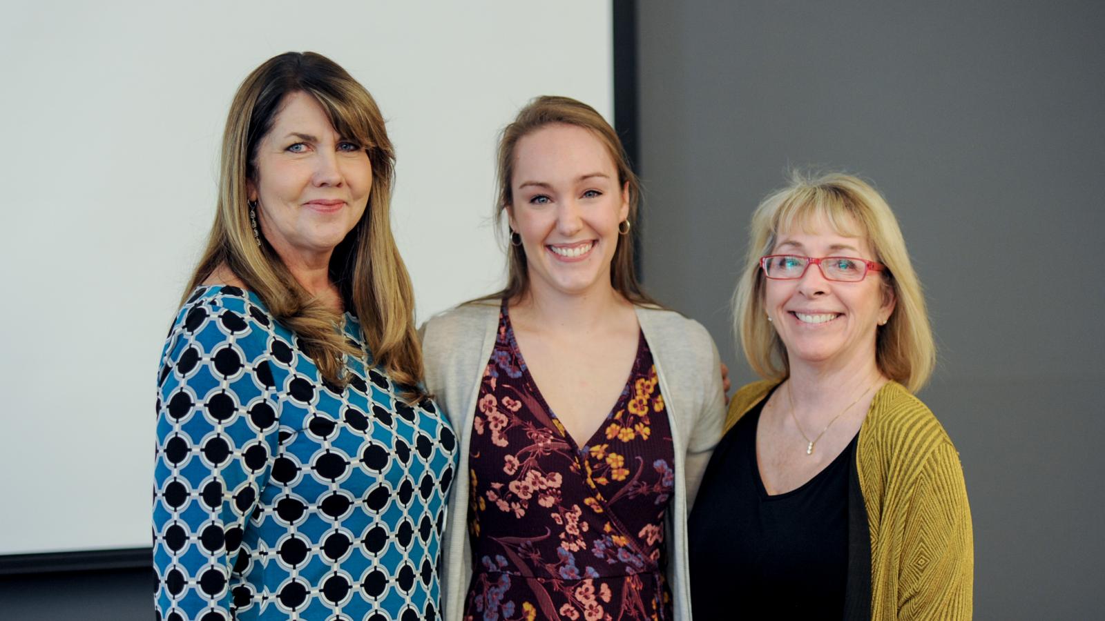 2018 AAEP Outstanding GTA and Graduate Associate Teaching Award winner Elle Pierman (center) with course advisors Dr. Shari Savage (left) and Dr. Christine Ballengee Morris (right)