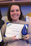 Rachel Skaggs standing with award