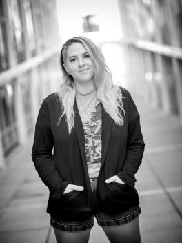 Black and white photo of woman smiling at camera