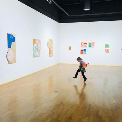 [3. Percy exploring the show; 4.Picture of Molly Jo Burke with Athena during install at Illinois Wesleyan]