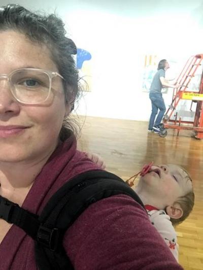 [3. Percy exploring the show; 4.Picture of Molly Jo Burke with Athena during install at Illinois Wesleyan]