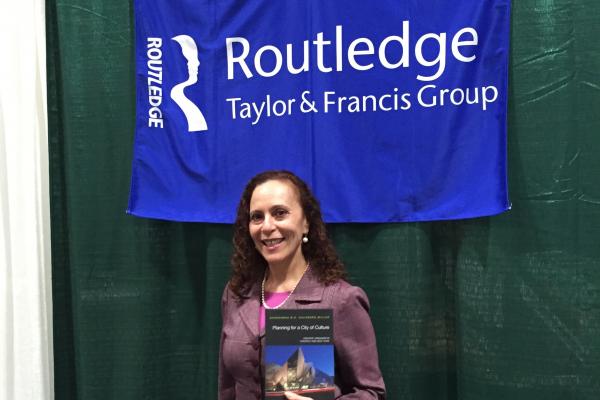 Dr. Goldberg-Miller at the Routledge booth of the American Association of Geographers annual conference, Boston, April 2017