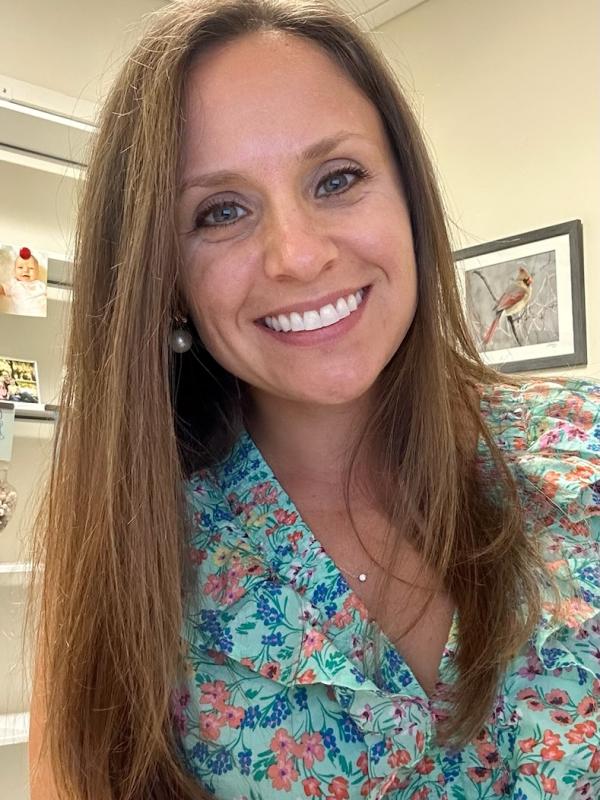 A person smiling at the camera